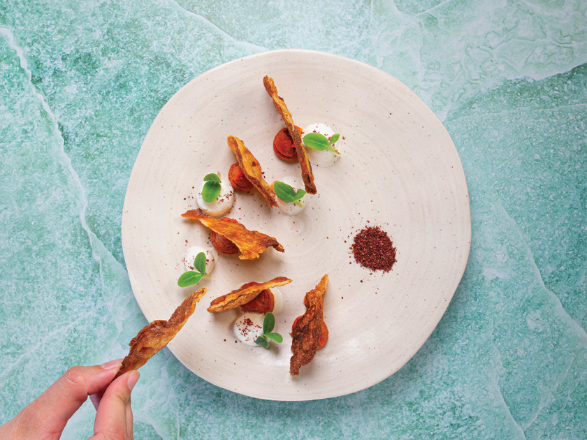 Crispy milk, brown butter with muhammara and labneh cream