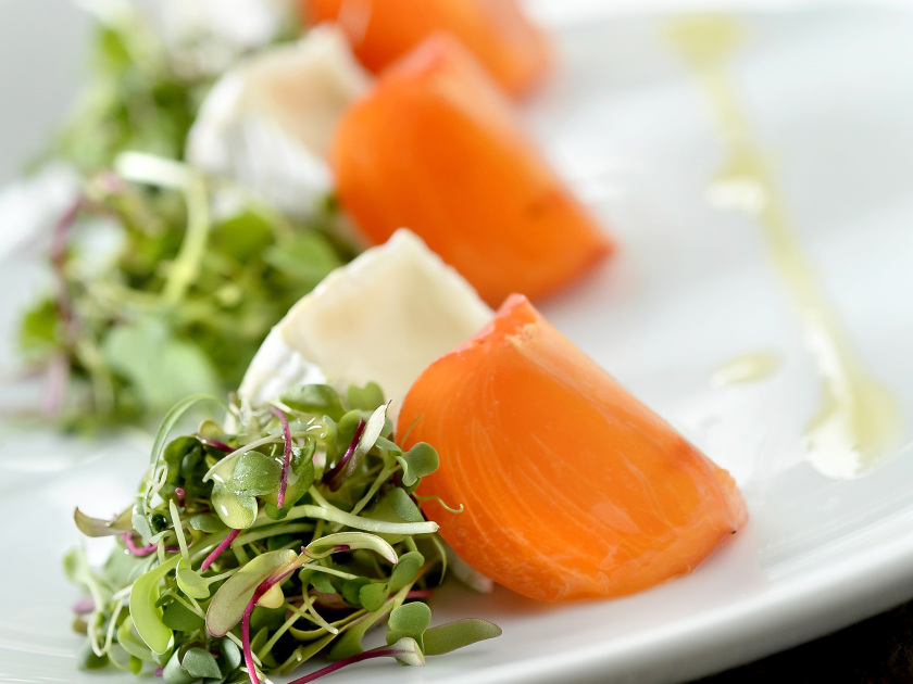 Camembert and persimmon salad with honey vinaigrette