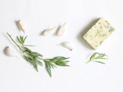 Butter with garlic petals and tarragon